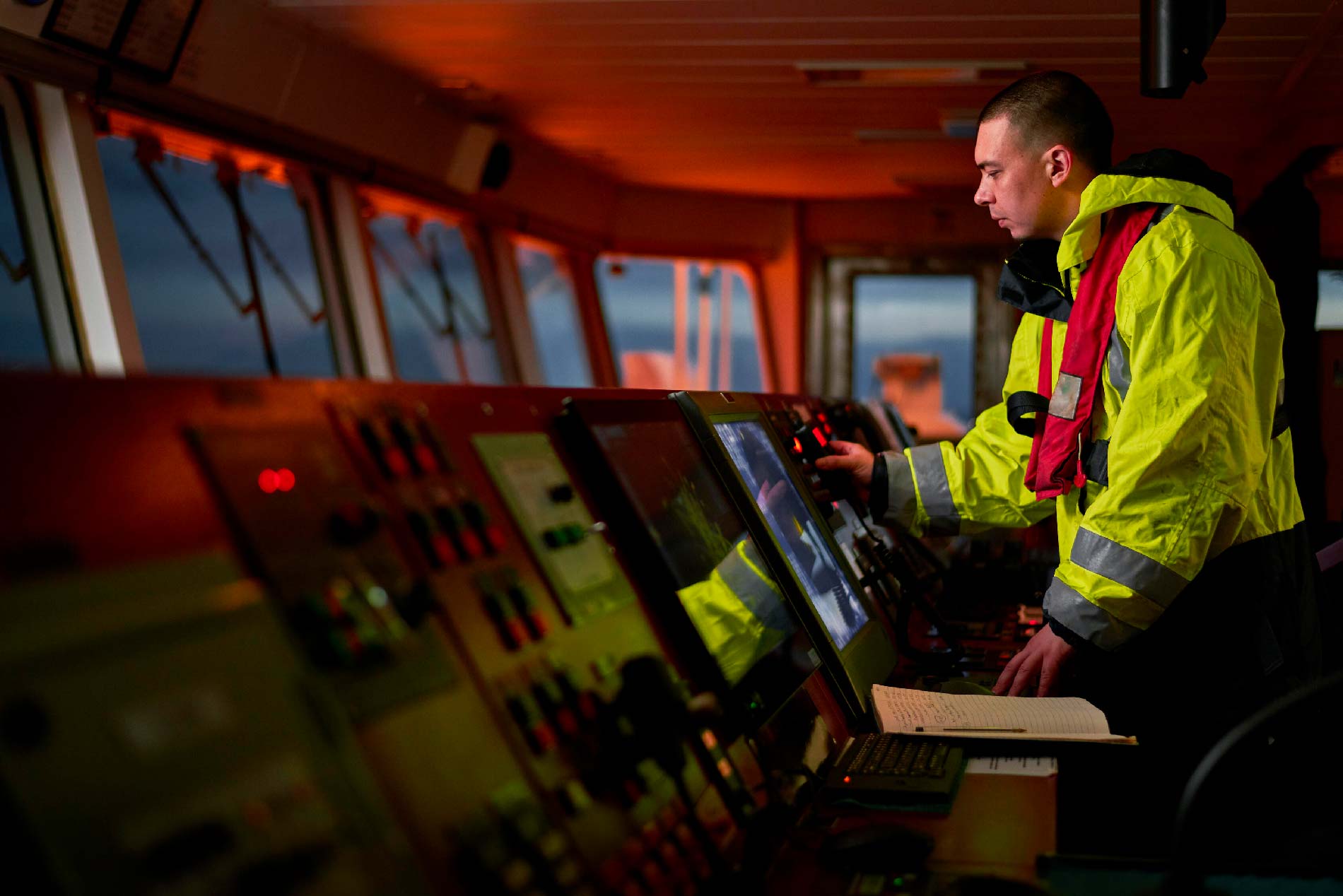 Maritime rescue operator at command station